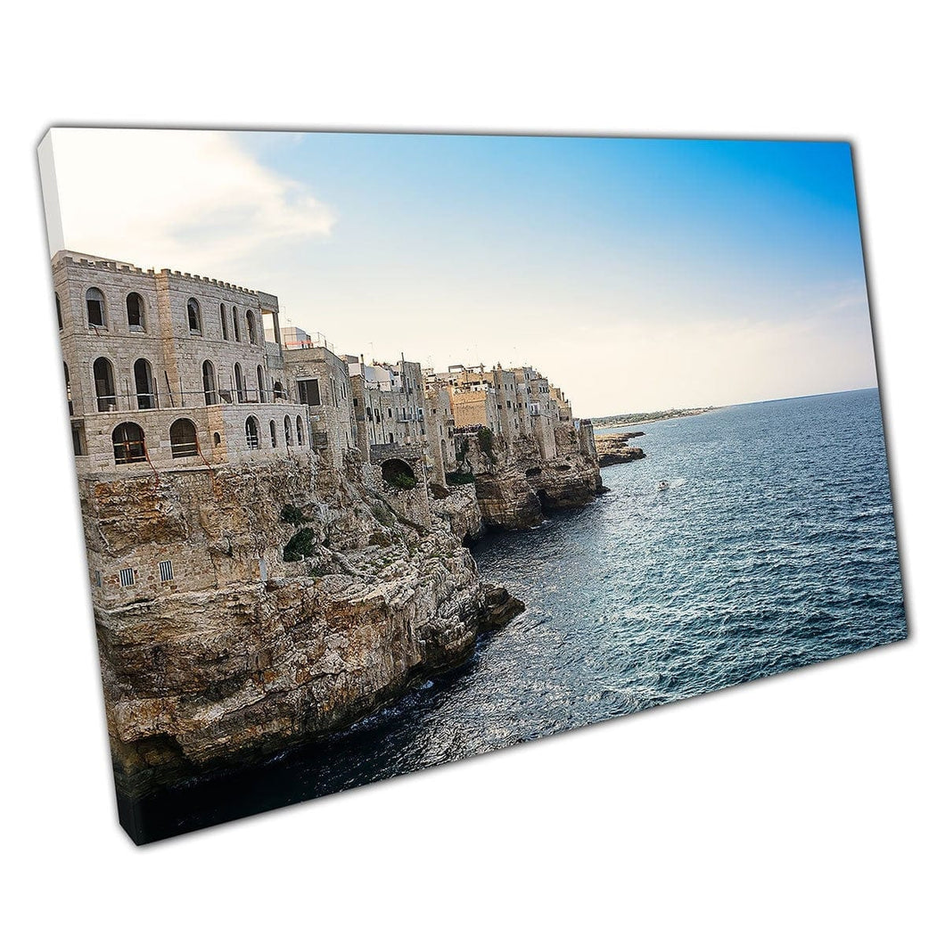 Mooie verweerde Rocky Cliff Coastline Polignano A Mare Italië zeegezitter Wall Art Print op canvas gemonteerde canvas print